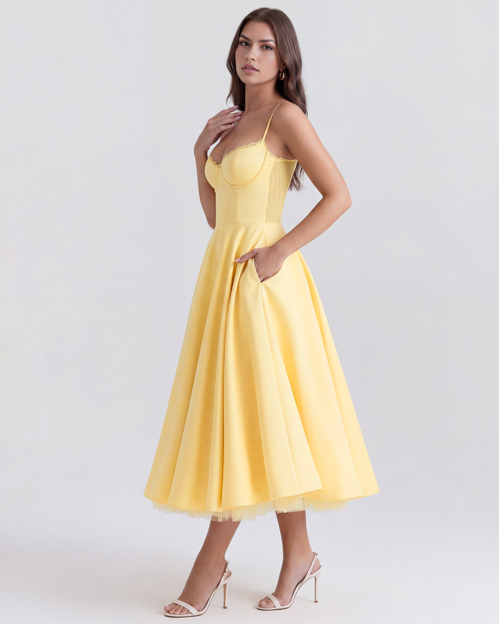 Butter yellow corset-style midi dress with flared pleated skirt and thin straps