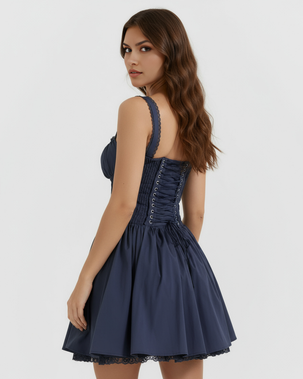 Dark blue corset mini dress with lace-up back eyelets and lace-trimmed hem, flared skirt