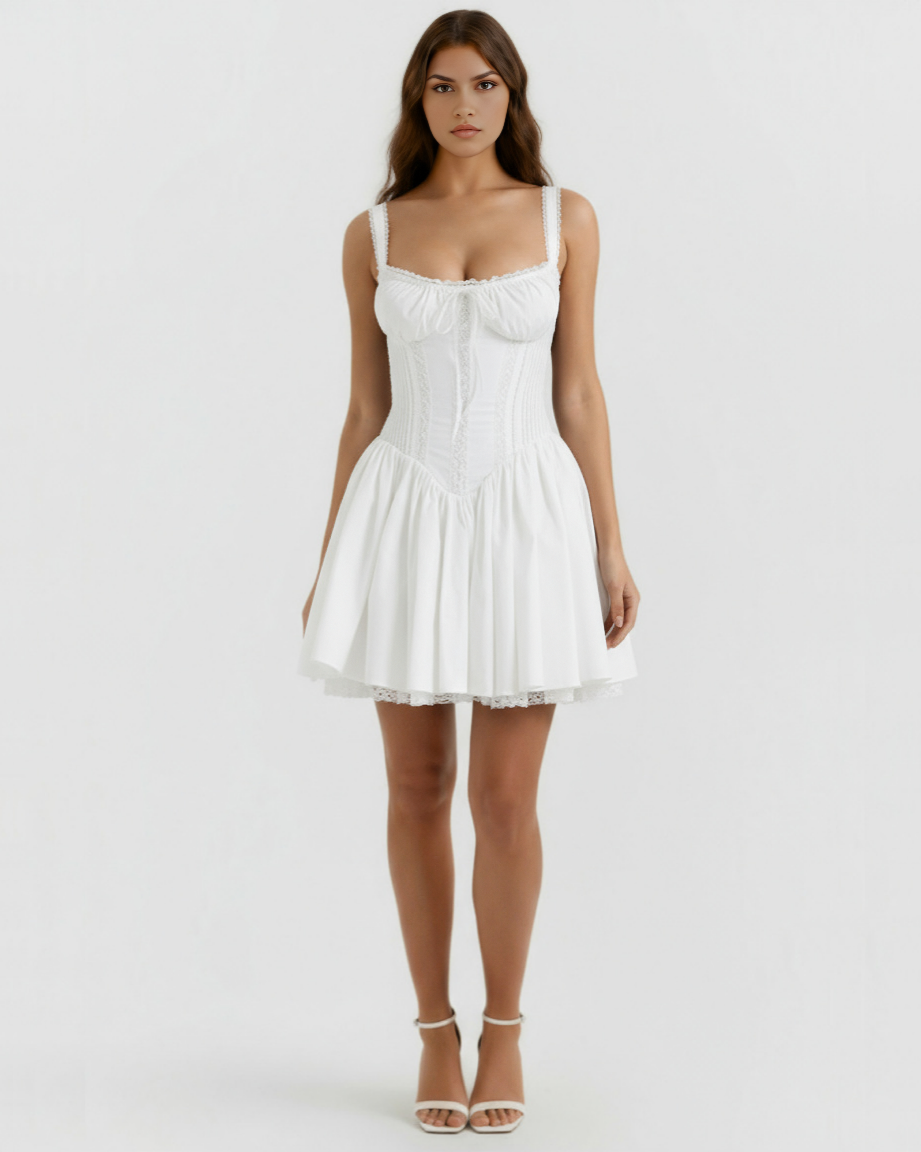 White corset-style mini dress with lace-trim spaghetti straps and ruffled hem