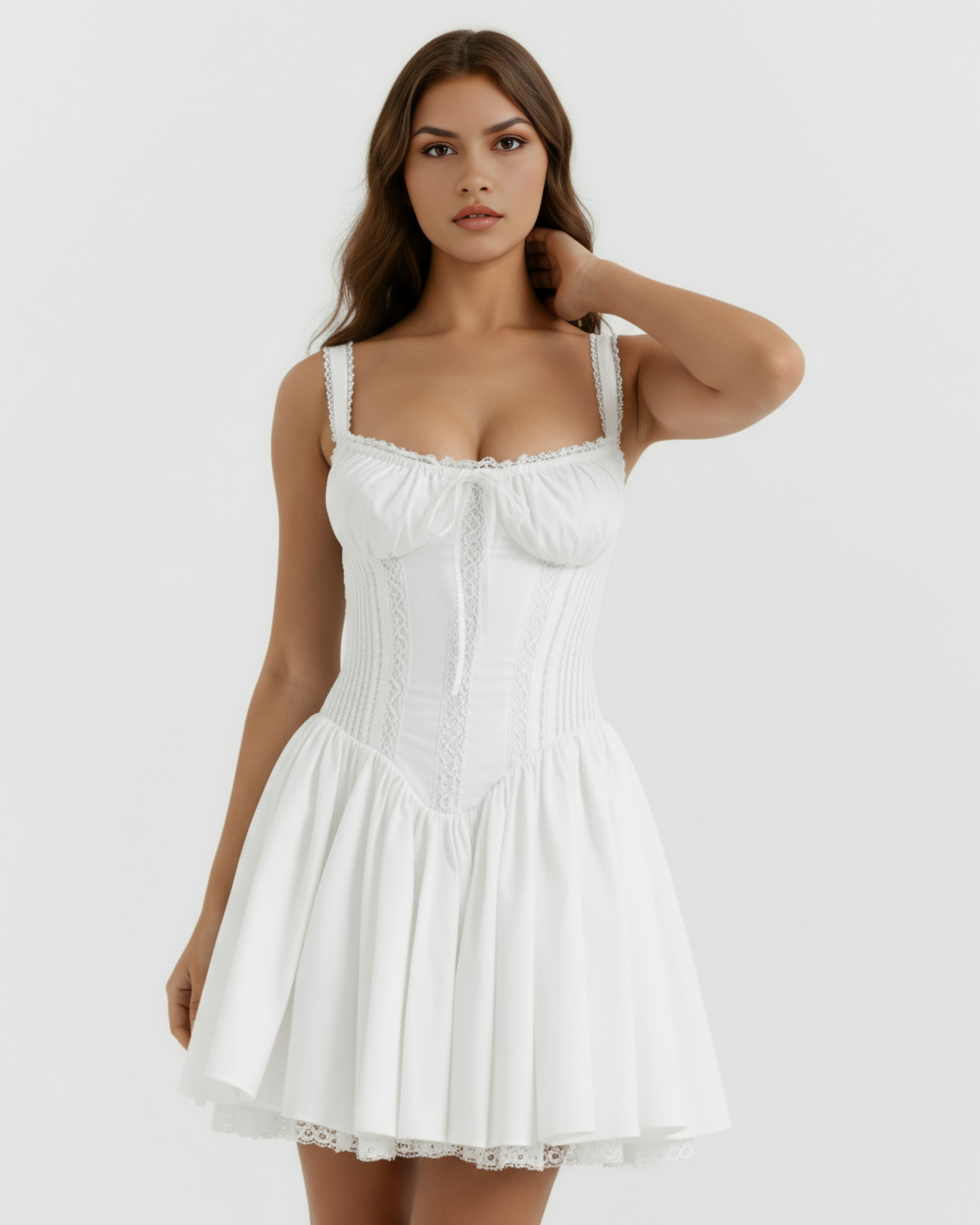 White mini dress with lace panel bodice, gathered bust, and pleated skirt
