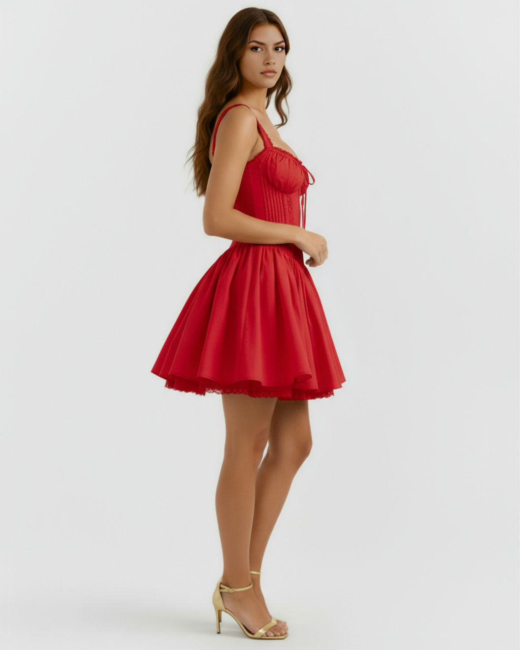 Red mini dress side view with thin straps, gathered bust, and short flared skirt
