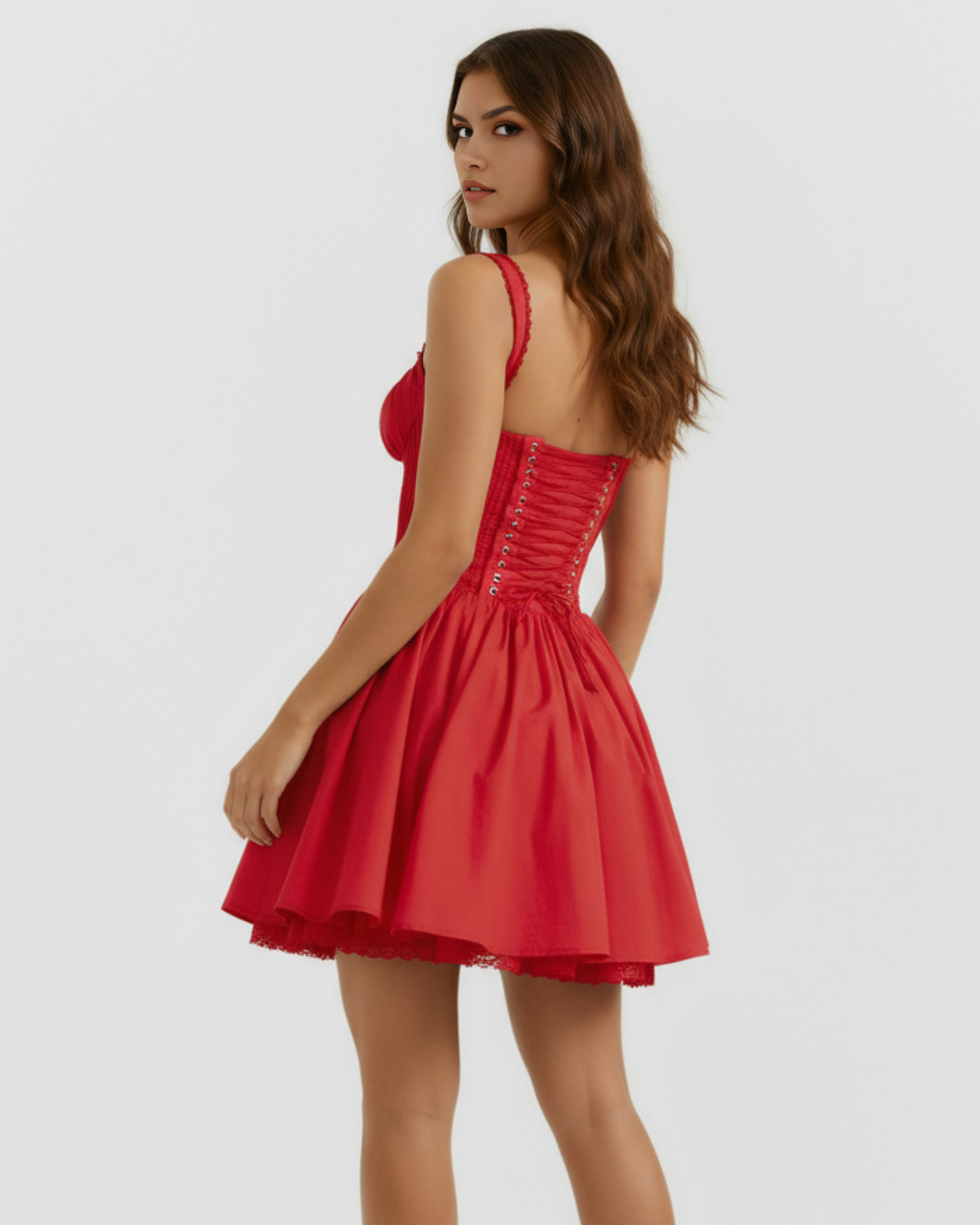Red sleeveless corset-style mini dress with button detailing and flared skirt