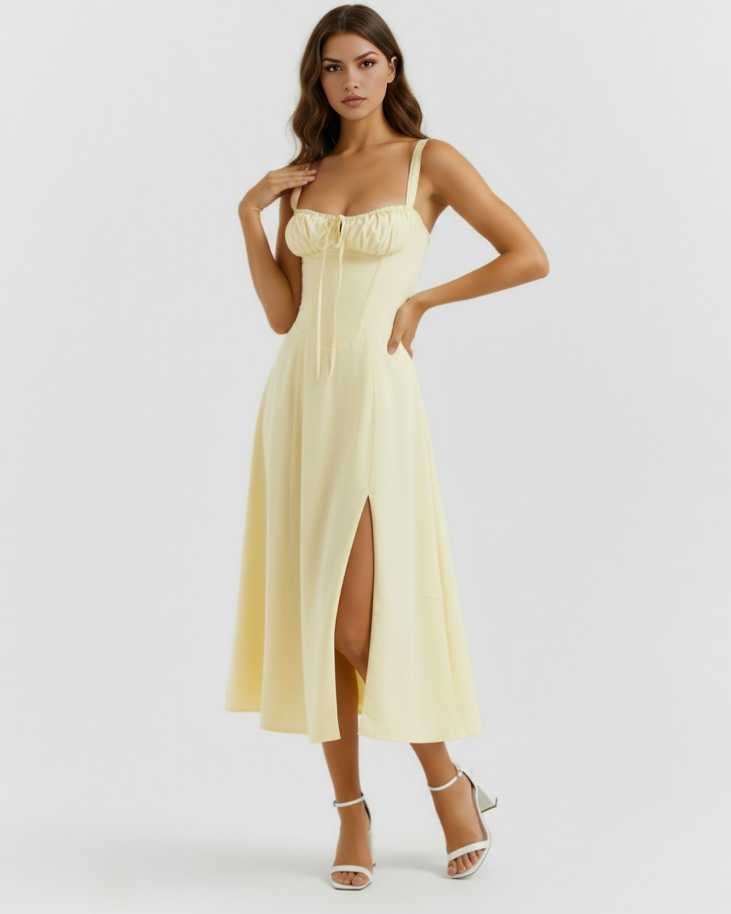 Light yellow midi slip dress with ruched bust, drawstring waist detail, and front slit