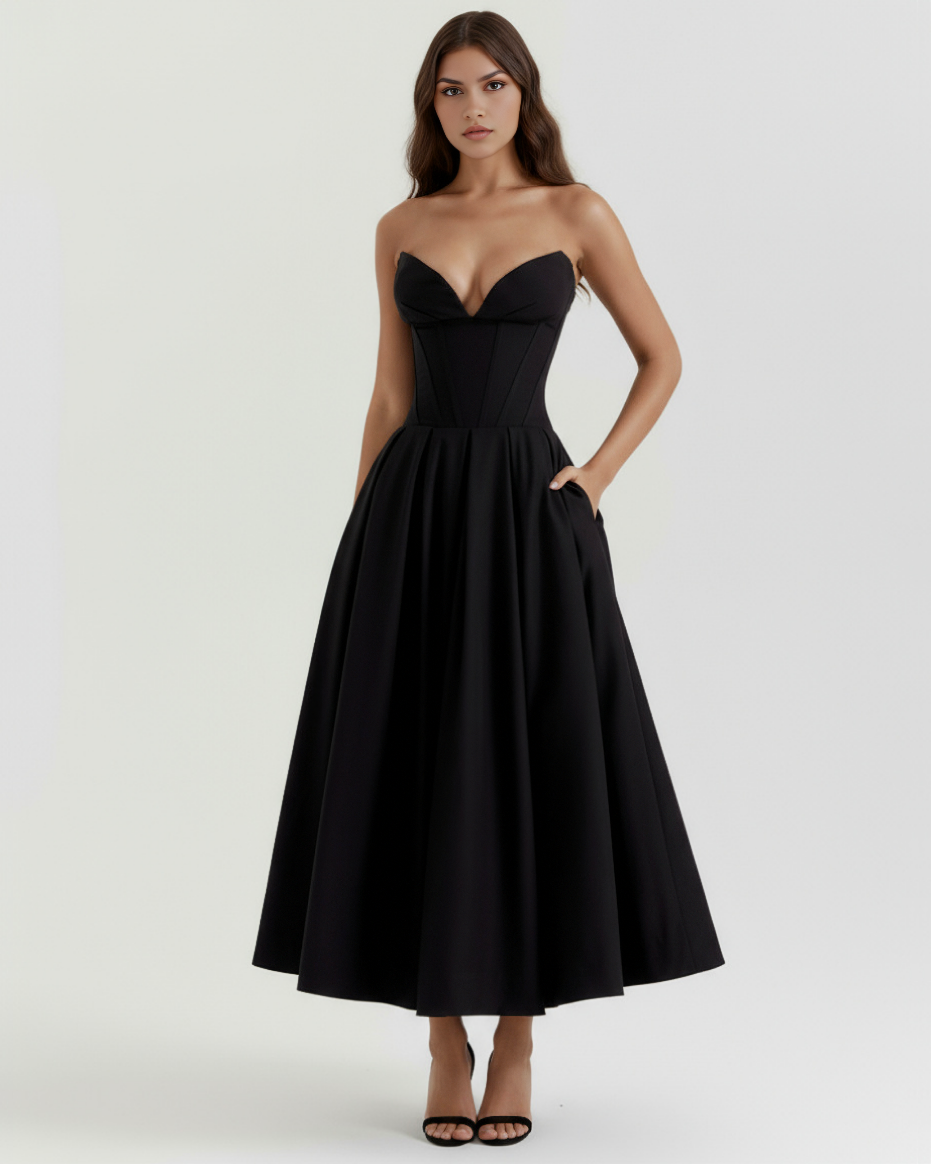Black strapless sweetheart corset midi dress, fitted waist and flowing pleated skirt