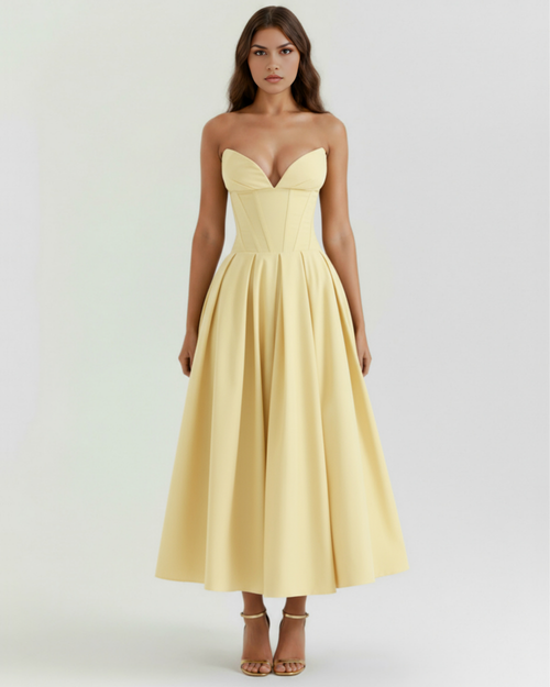 Light yellow strapless corset-style midi dress with V-shaped bust and pleated skirt