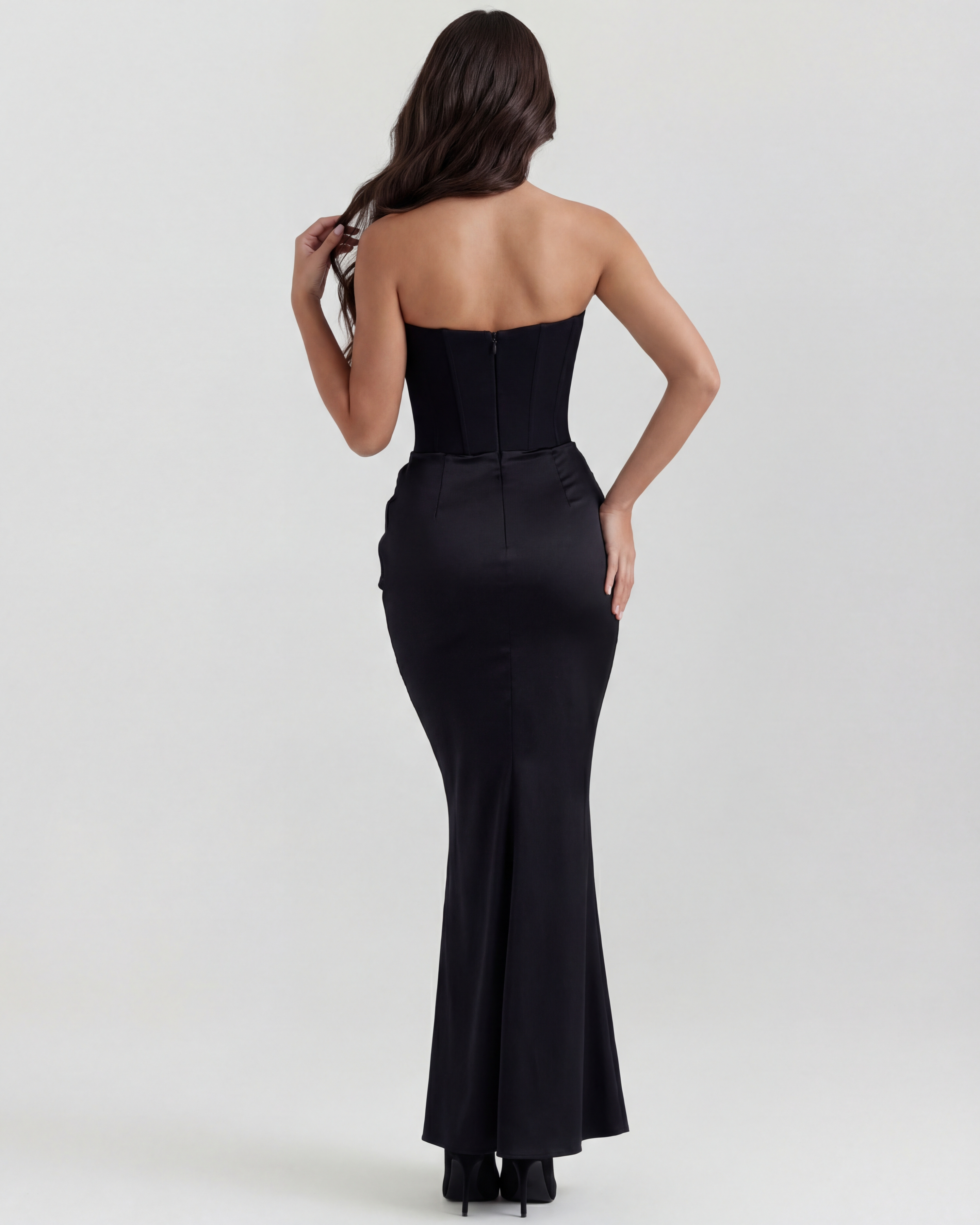 Black strapless corset back with long fitted skirt and flared hem