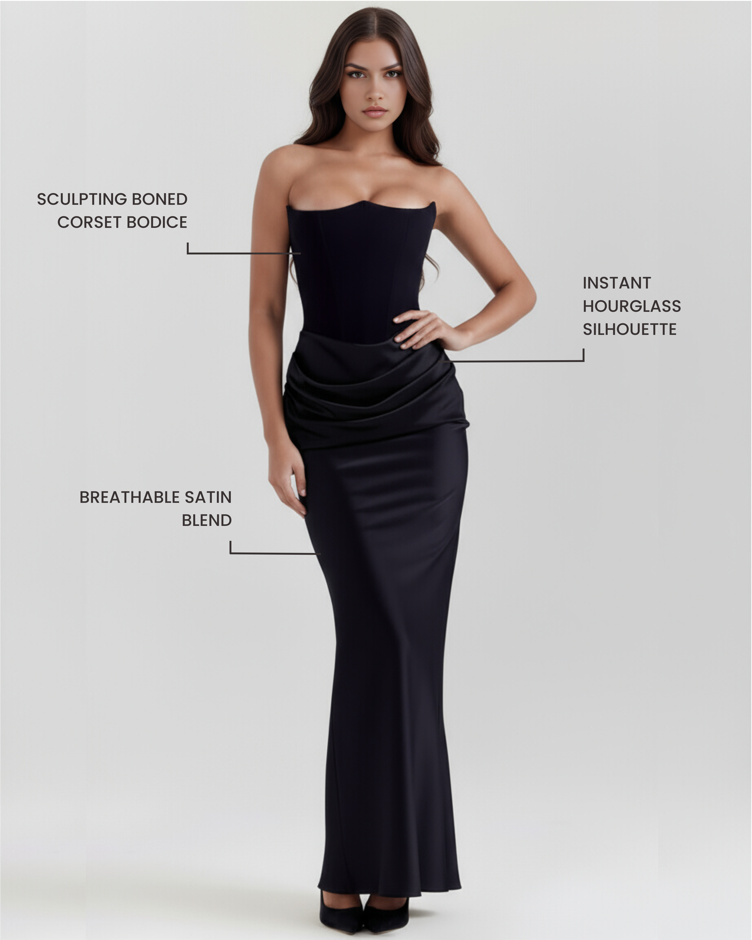 Black strapless fitted evening gown with boned corset bodice and draped satin waist